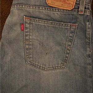 Levi's Classic Blue Jeans with Red Tag. Summer Moving Sale. Great condition.